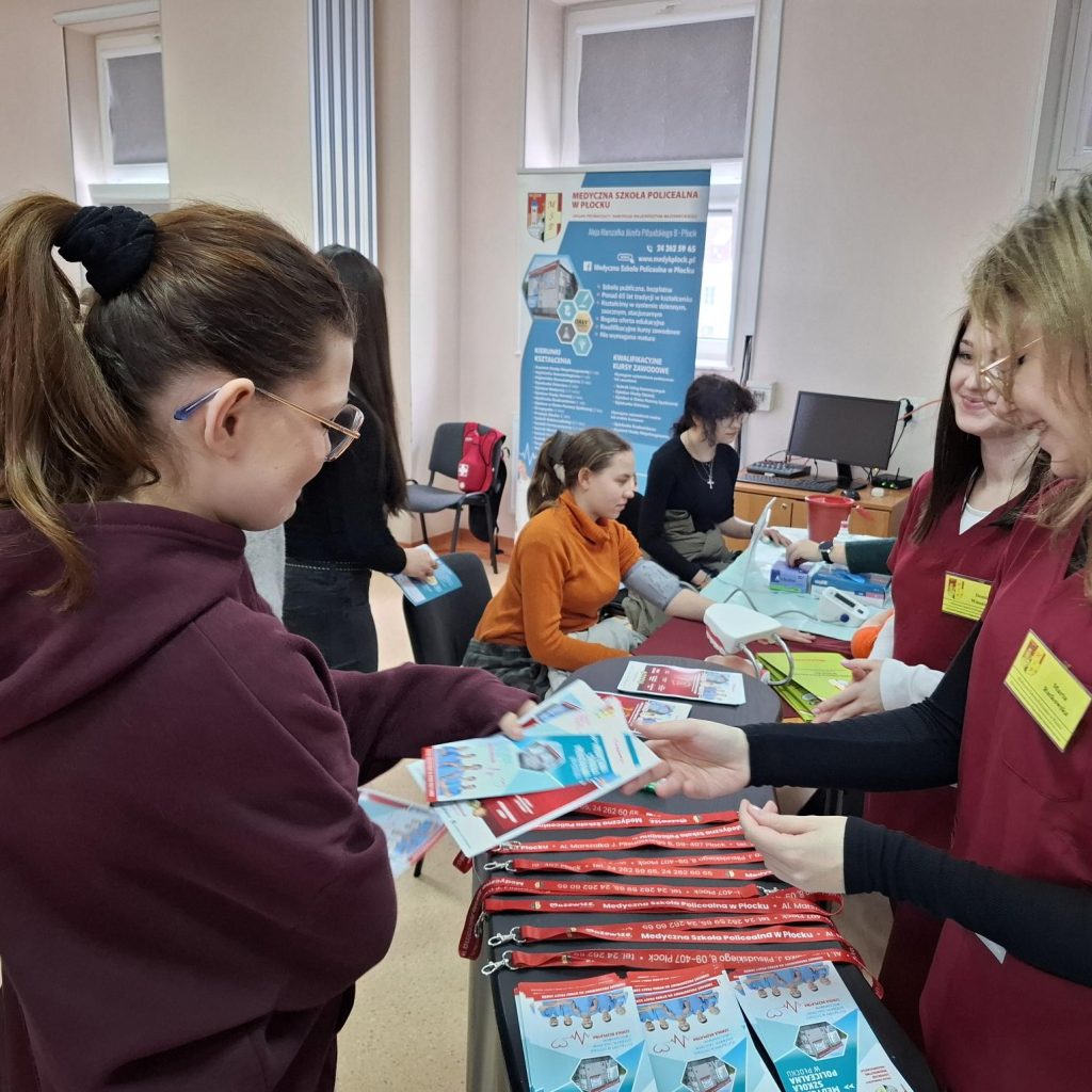 Słuchacze i goście stoiska