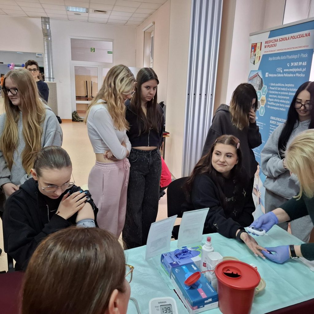 Słuchacze i goście stoiska