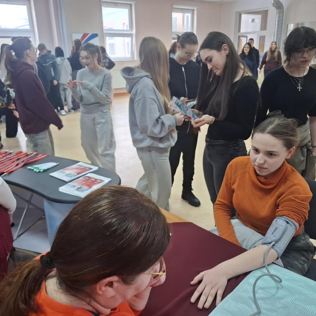 Słuchacze i goście stoiska