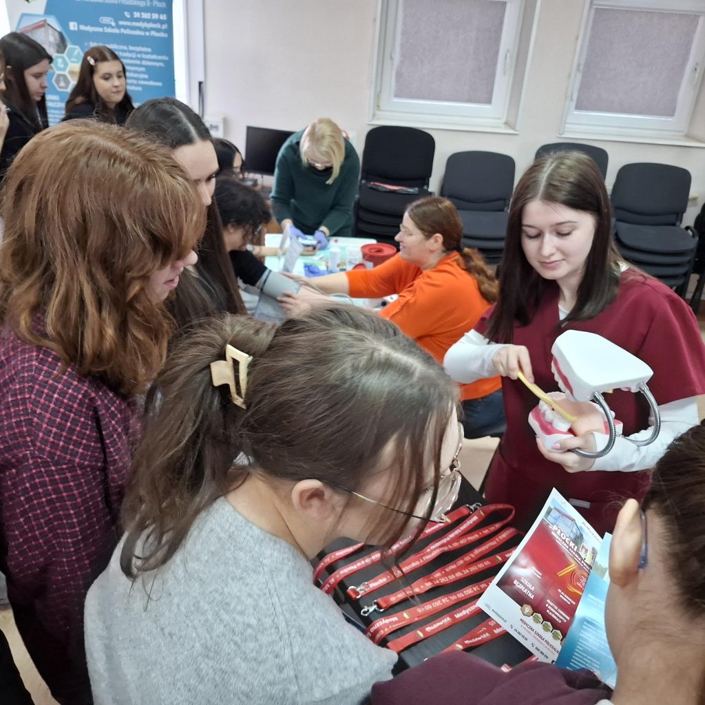 Słuchacze i goście stoiska